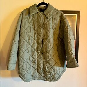 Green quilted jacket